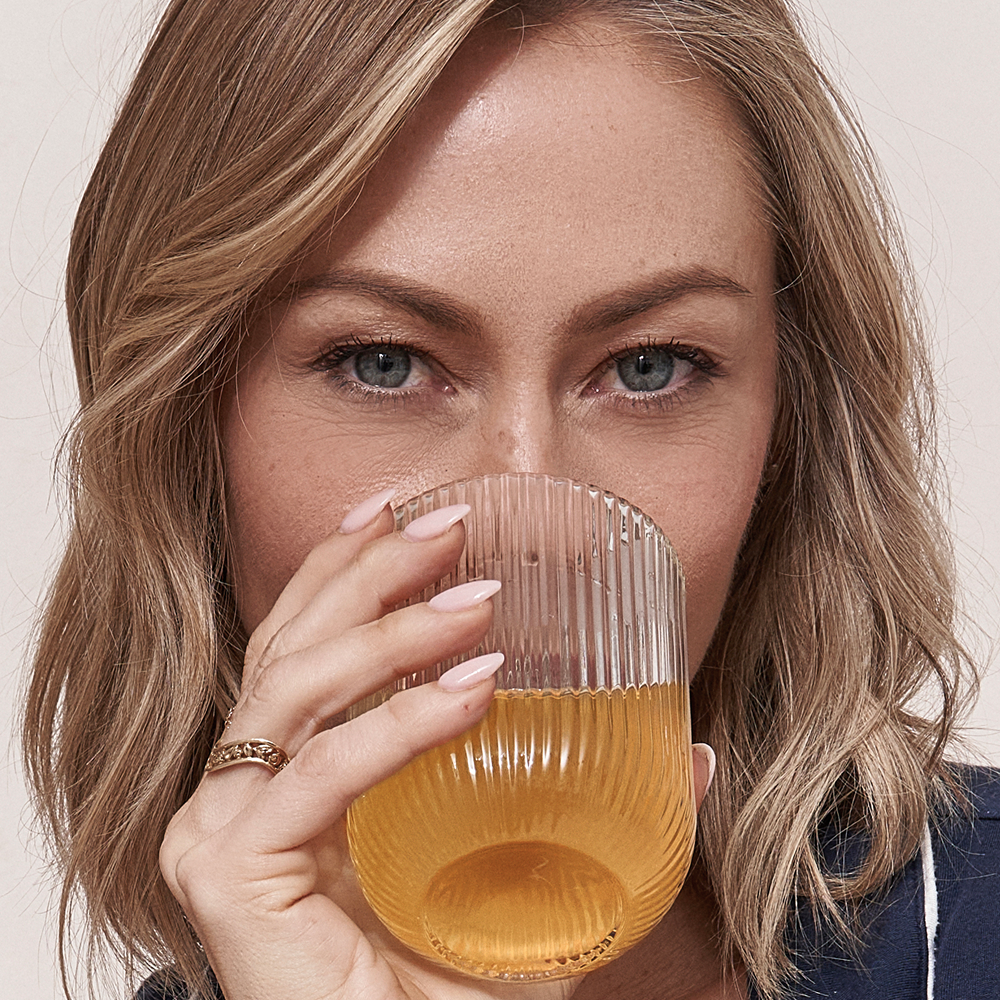 Woman drinking electrolyte breakthrough